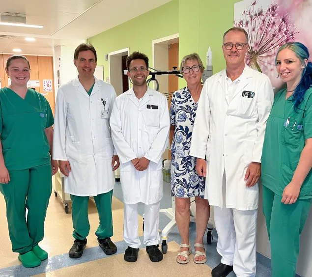 Bild mit Ärzten und Patientin